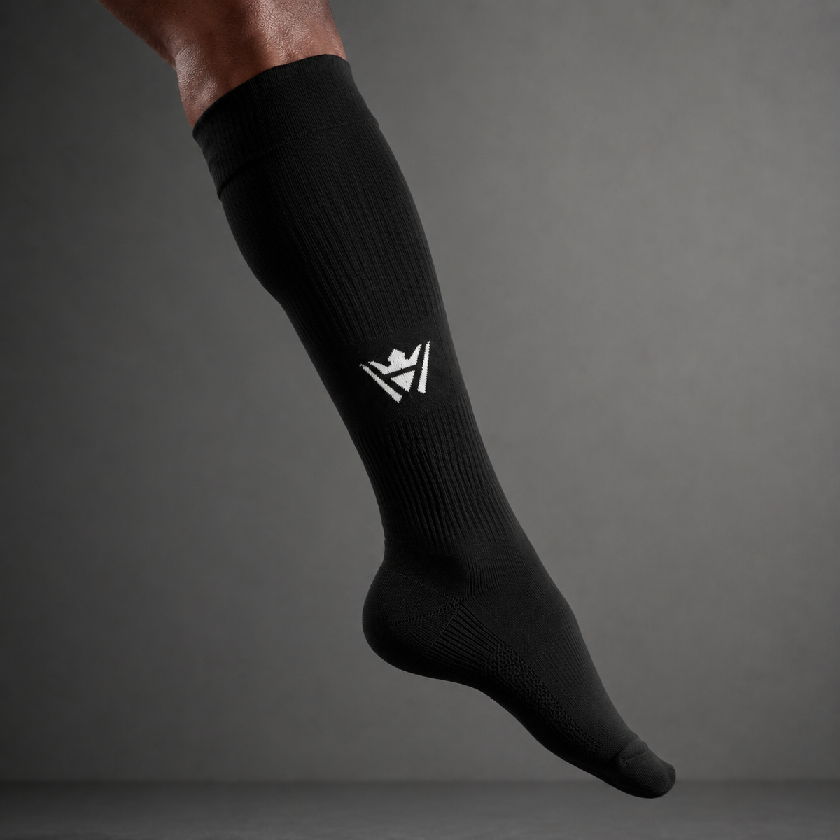 Player wearing Waly's White Navy Fade soccer socks